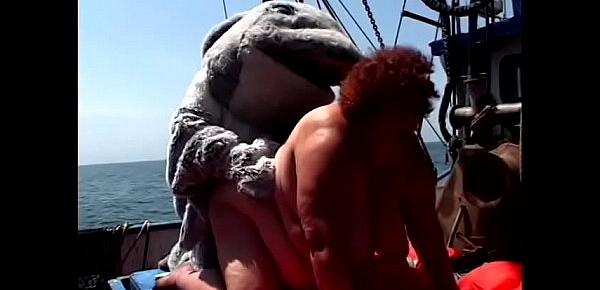  Huge bitch Tia Davis gets fucked and creamed by a man in a dolphin costume on the ship